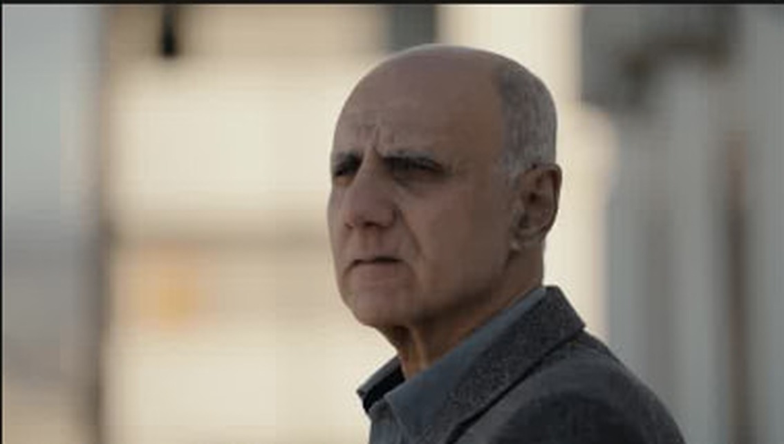 Interview portrait of an older man in Derna