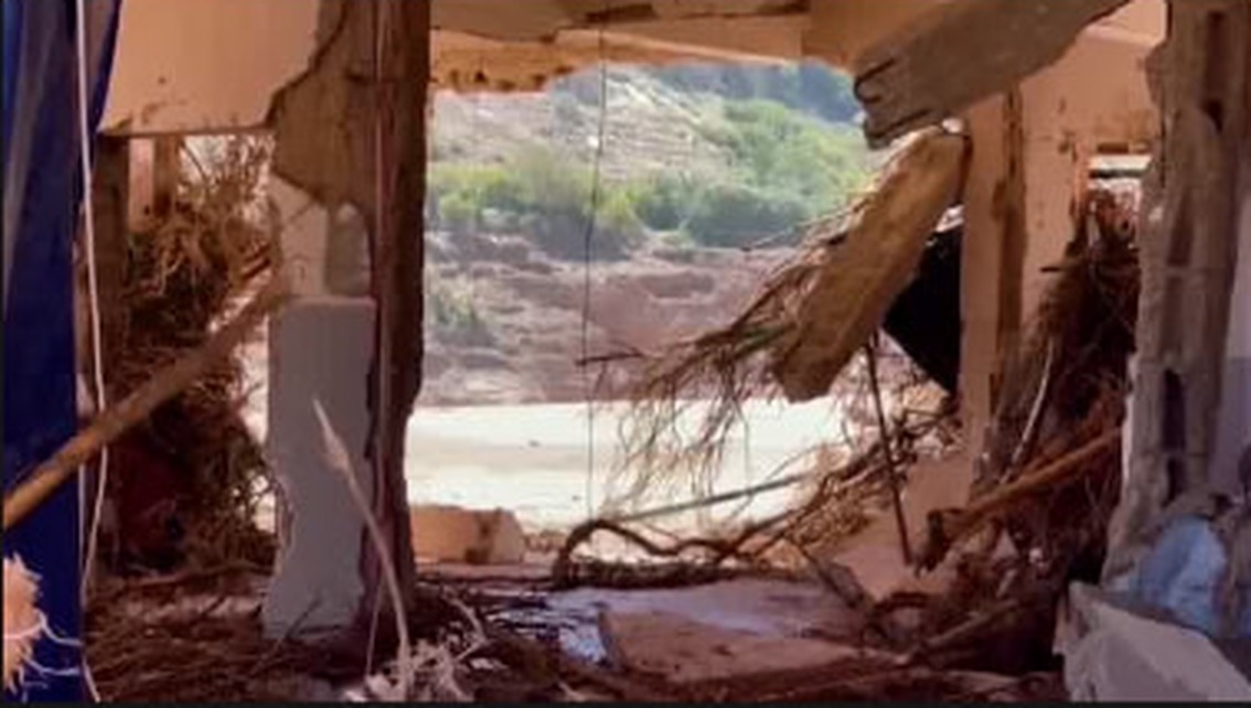 Interior detail seen through a broken wall opening